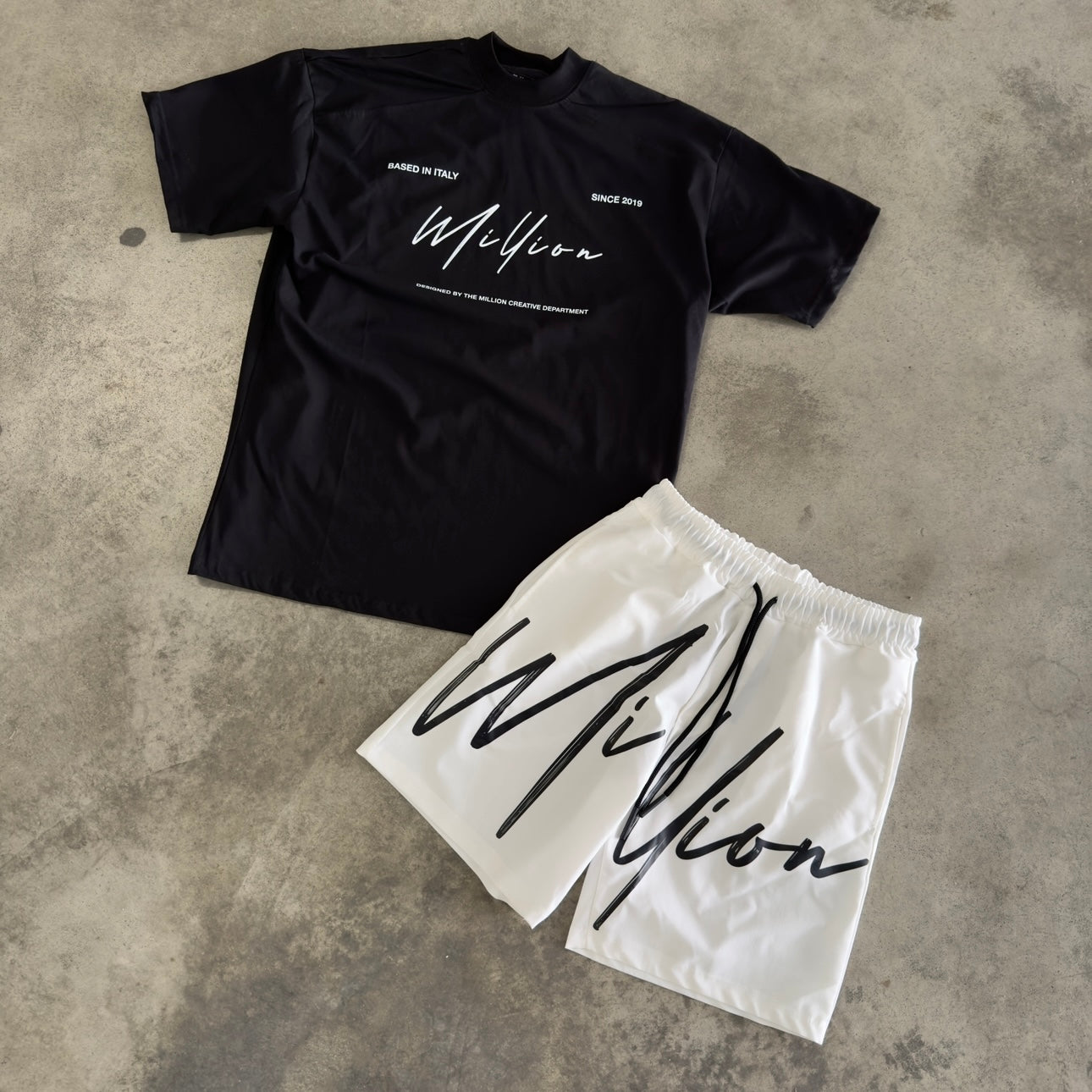 Outfit Million Signature Nero/Bianco