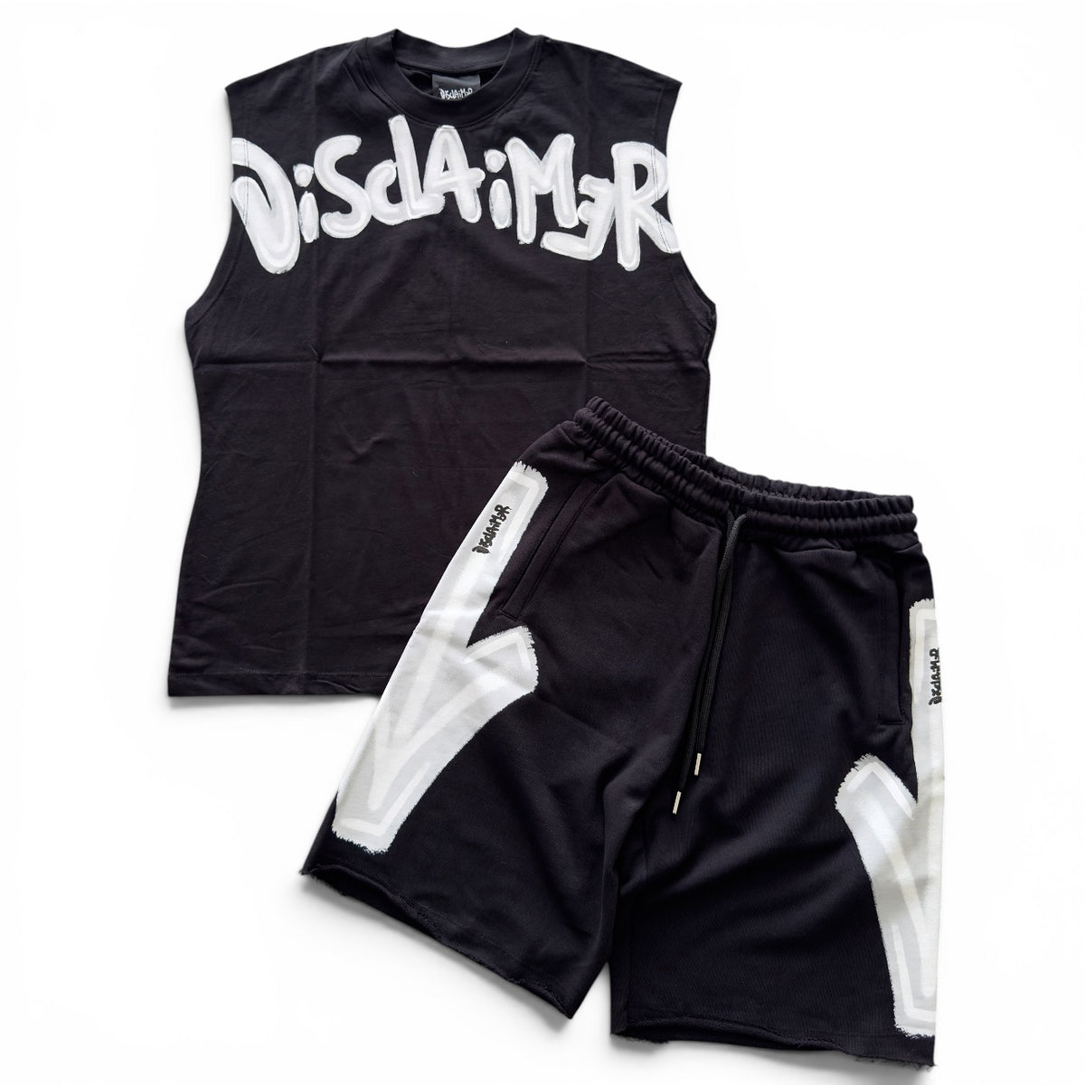 Outfit Disclaimer Smanicato Nero/Bianco 2026
