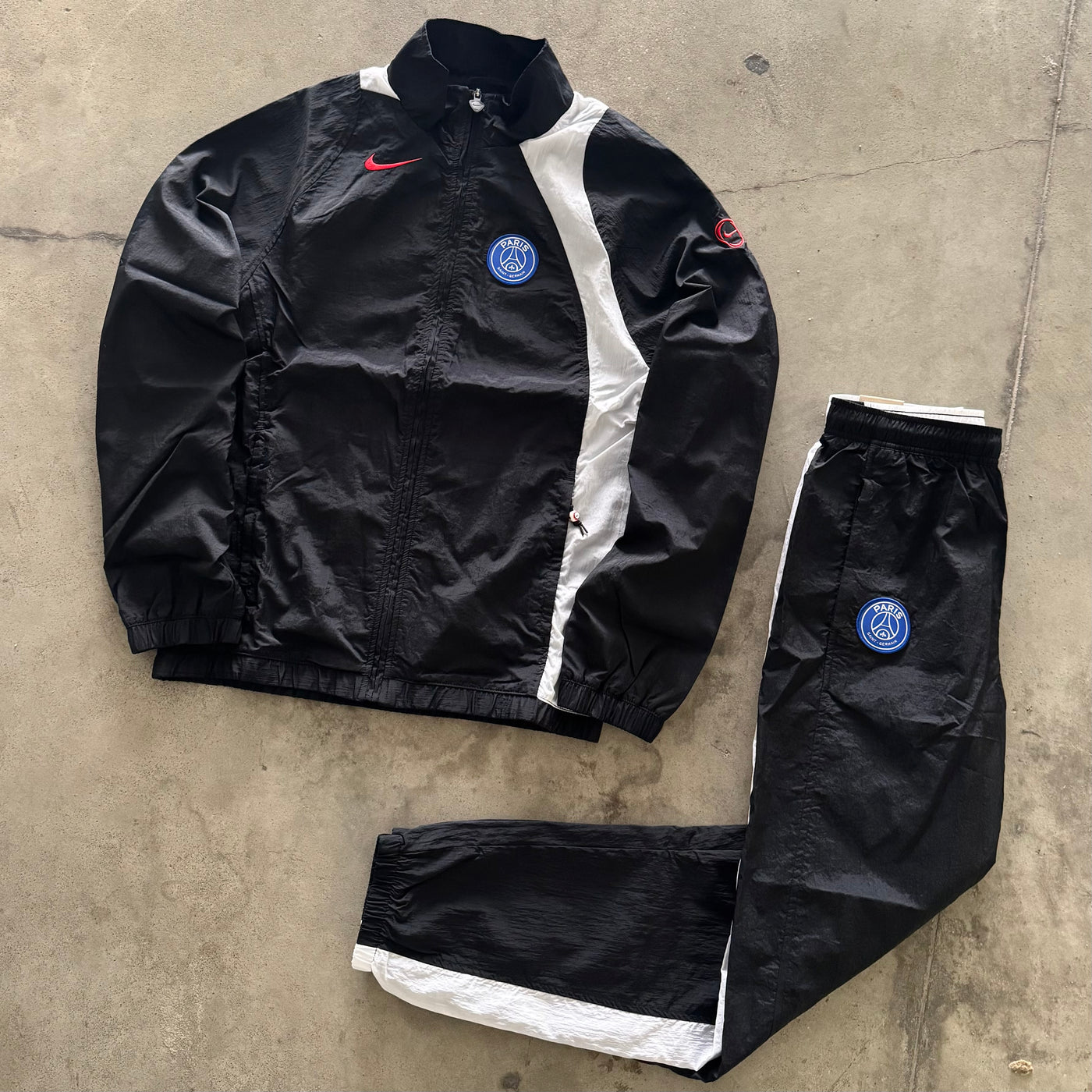 Tuta Nike T90 PSG con Zip 2026