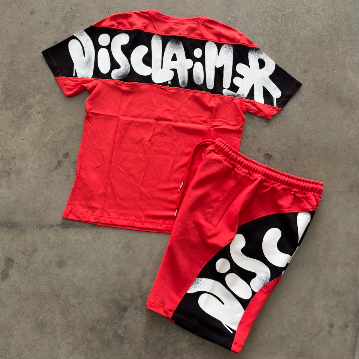 Outfit Disclaimer Rosso/Bianco 2026