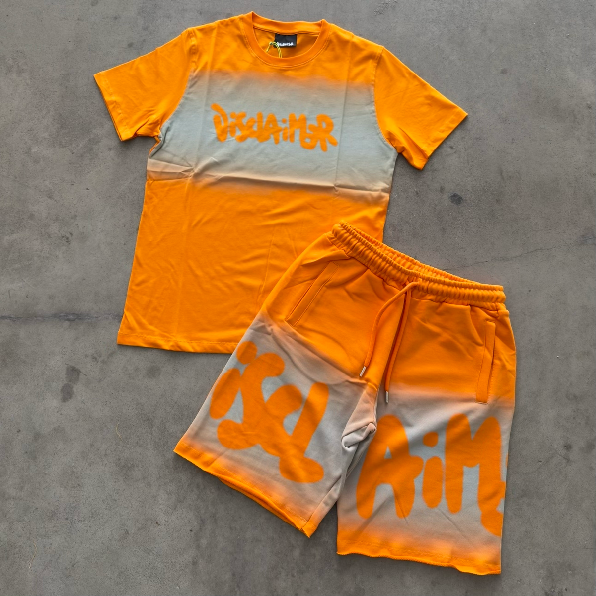 Outfit Disclaimer Sfumato Arancio 2026